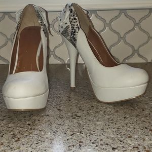 C label studded bow heels